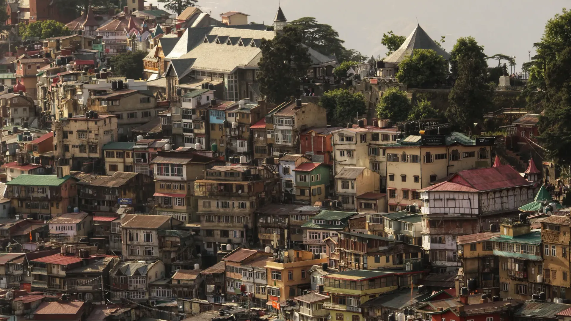 Pine-covered mountains and historic ridge buildings of Shimla
