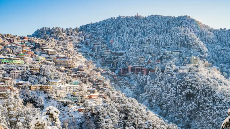 Snowy peaks and traditional streets in Shimla